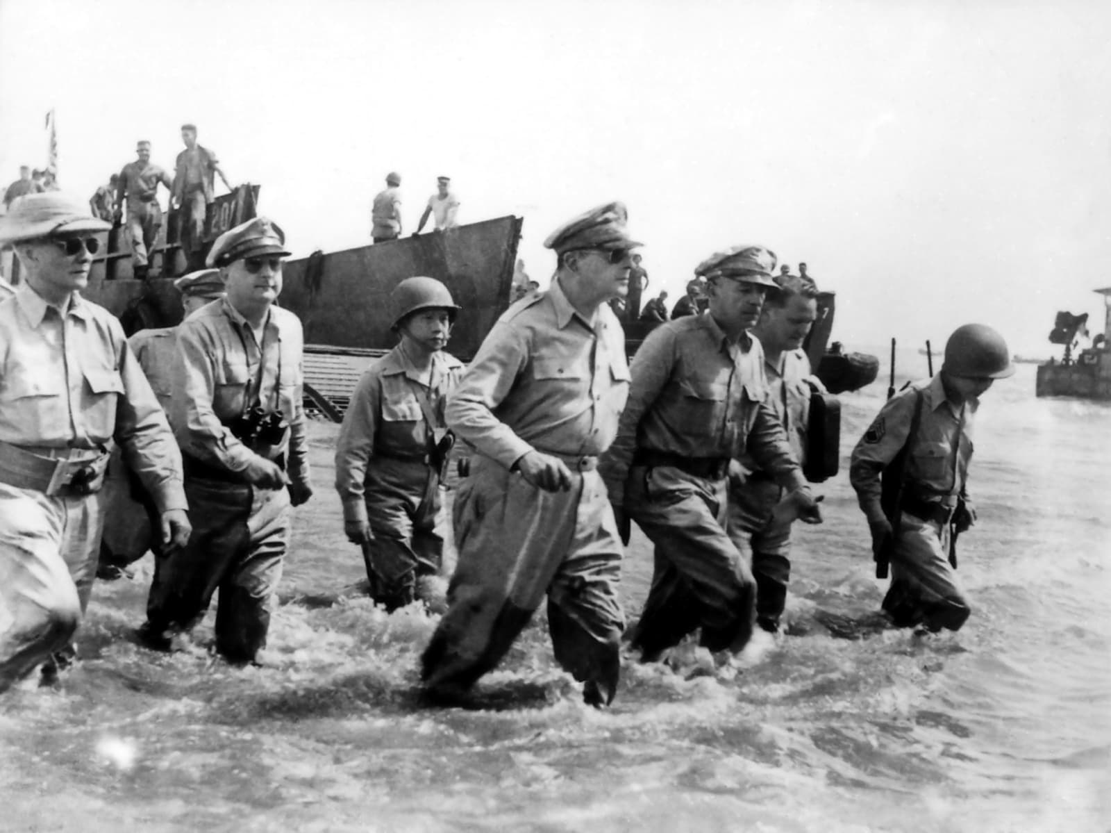 General Douglas MacArthur and staff wading ashore through the surf at Leyte