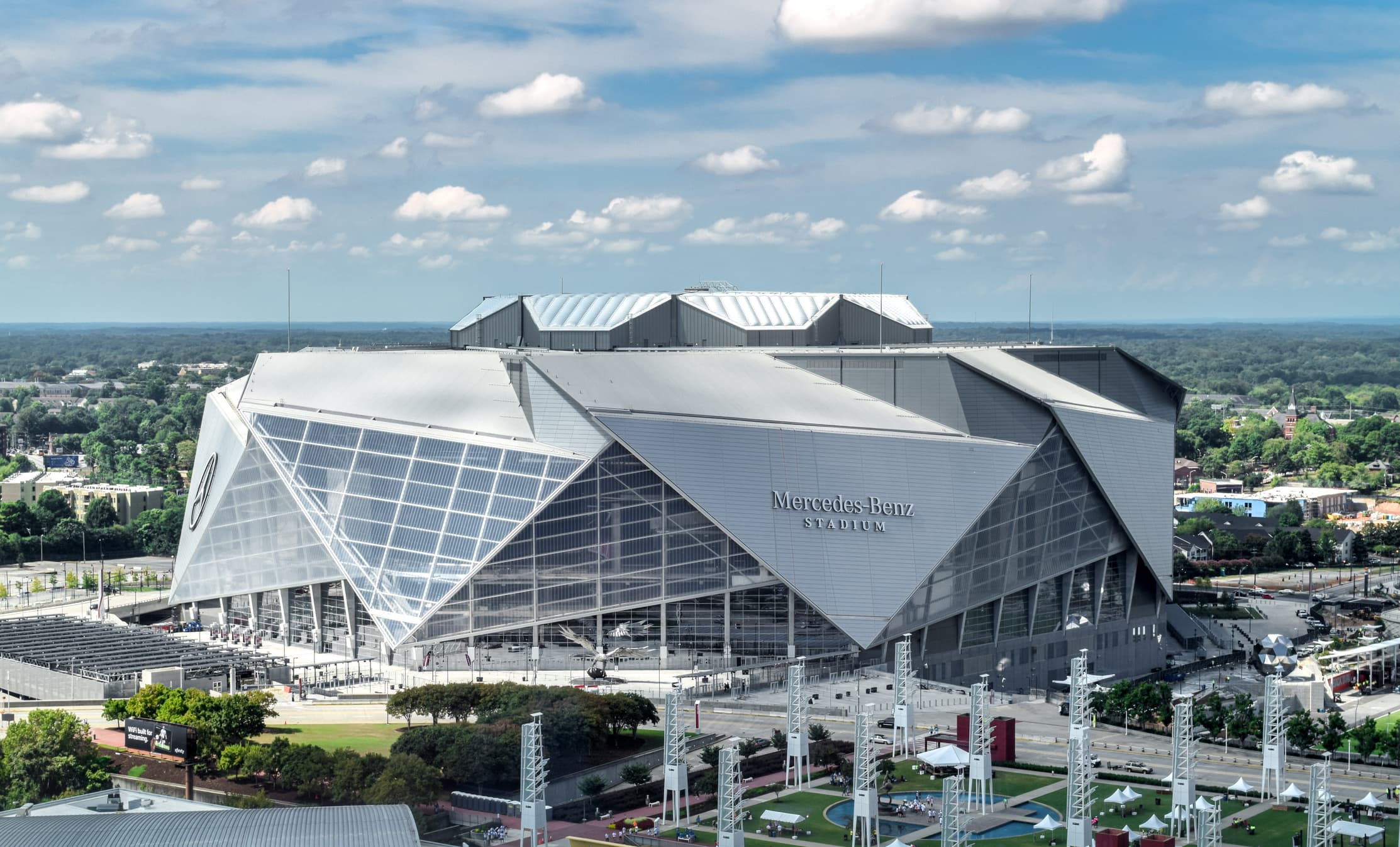 A gallery image from Sports: Mercedes Benz Stadium Exterior Aerial View Atlanta Daytime