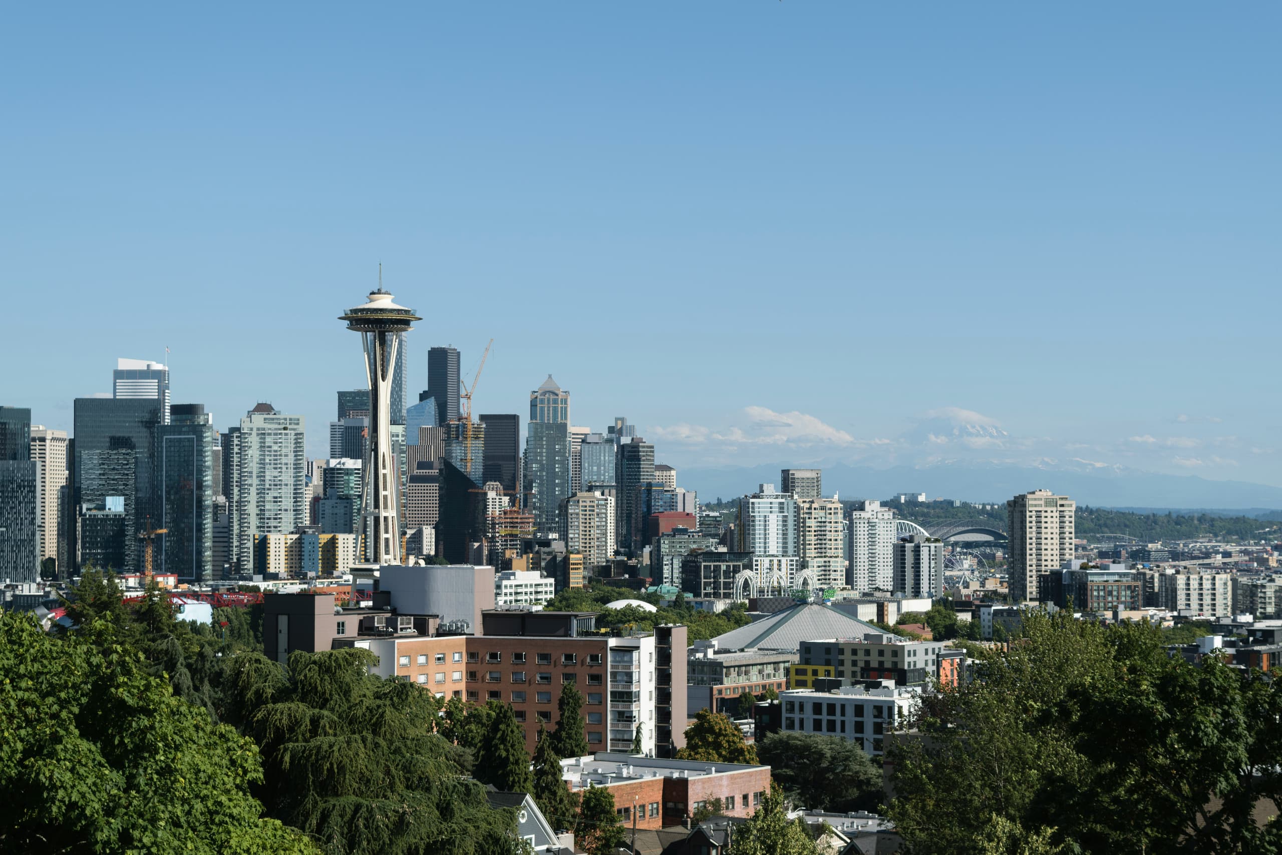 Daytime view of the Seattle skyline under clear light