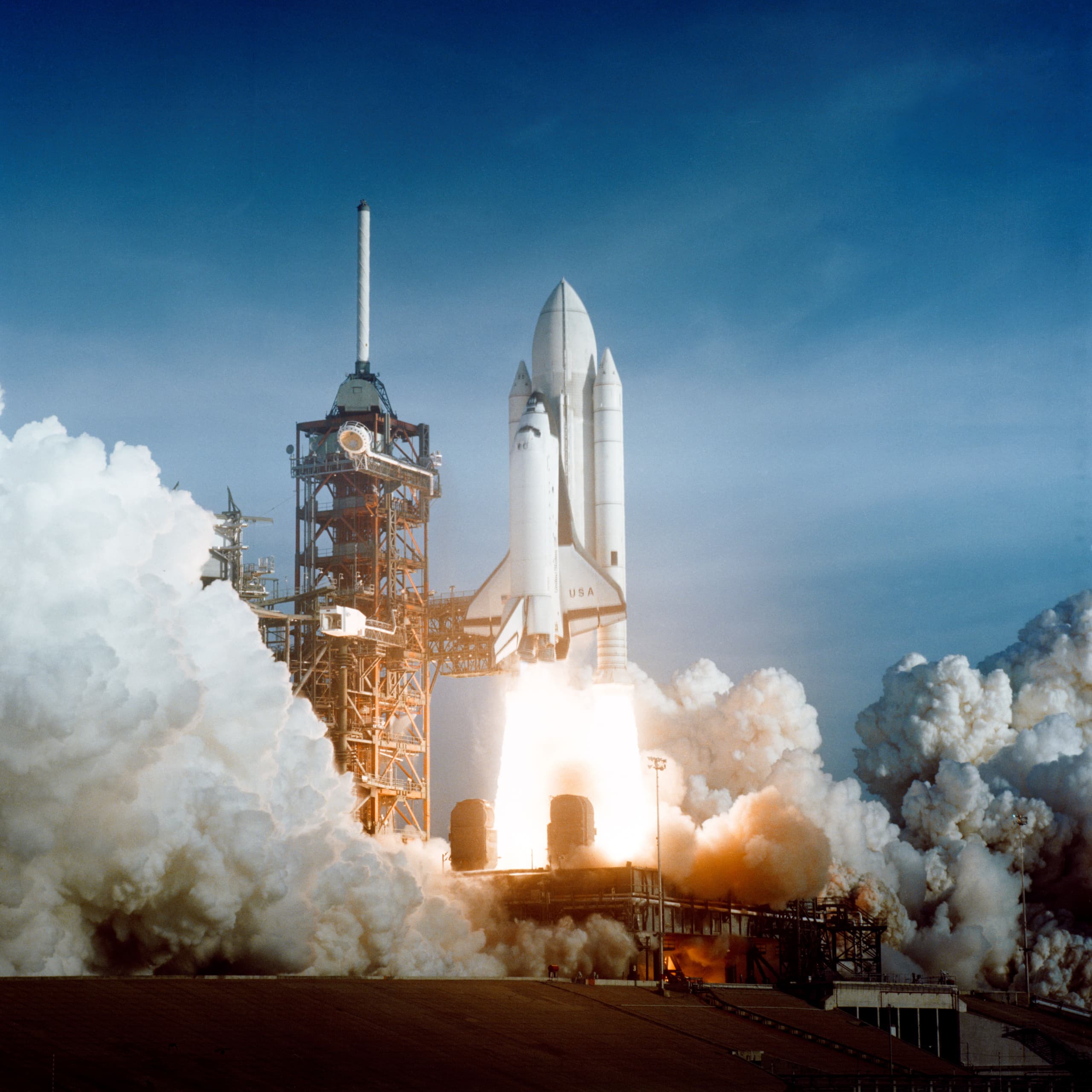 The first reusable spacecraft launches on STS-1.