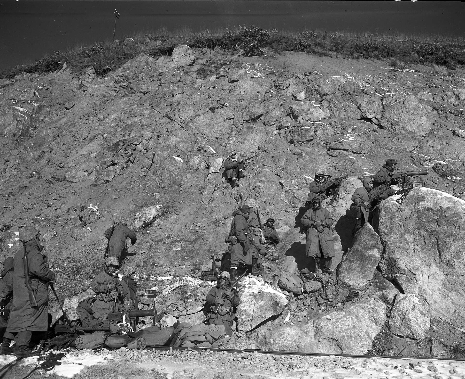 U.S. Marines on a frozen ridge fighting out of encirclement at the Chosin Reservoir
