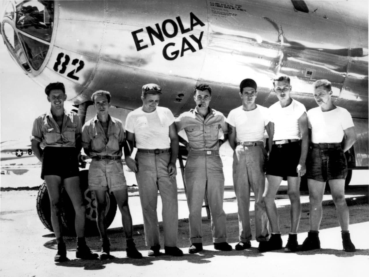 The crew of the B-29 Enola Gay lined up in front of the aircraft