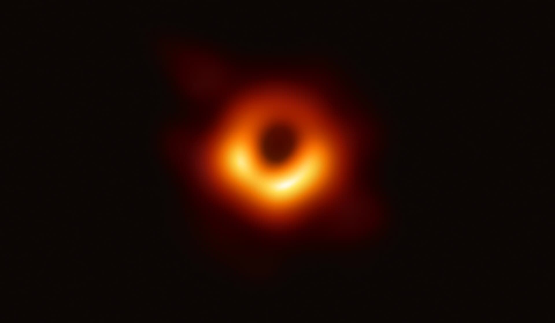 The first direct image of a black hole, the glowing ring around M87's shadow