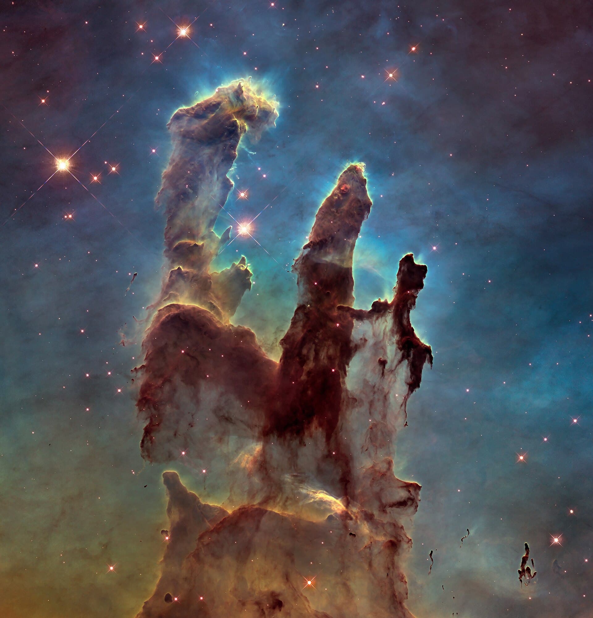 Towering columns of interstellar gas and dust in the Eagle Nebula