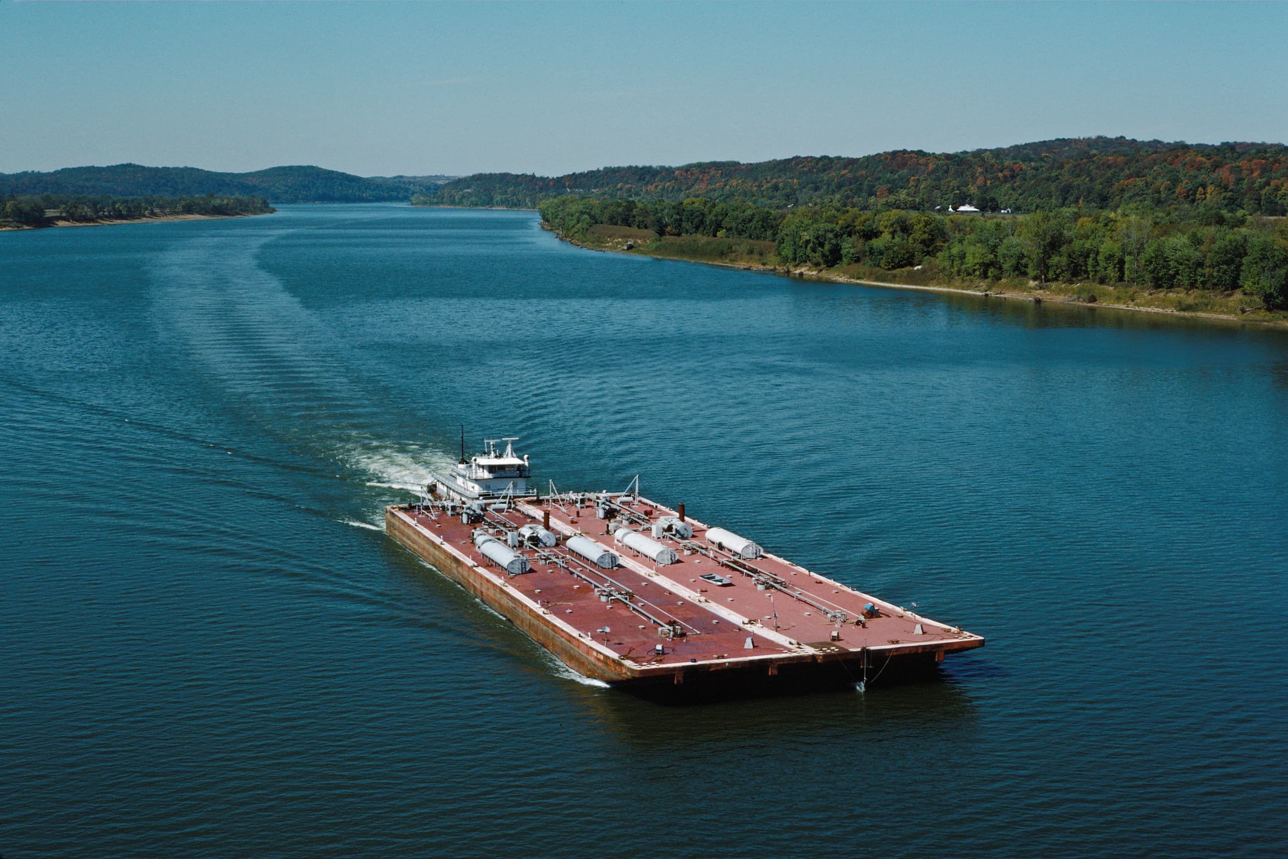 A gallery image from Landscapes: Ag Mississippi Barges