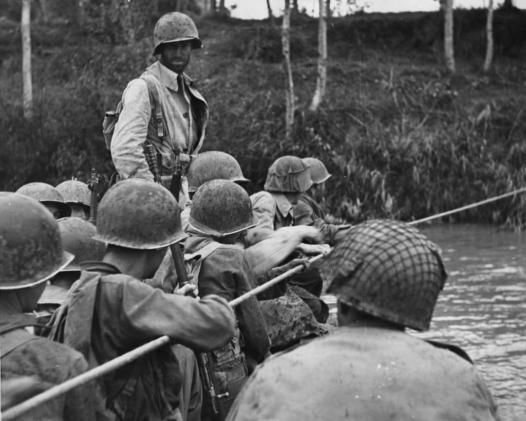 A gallery image from History: American Infantry Crossing The Volturno River, October 1943