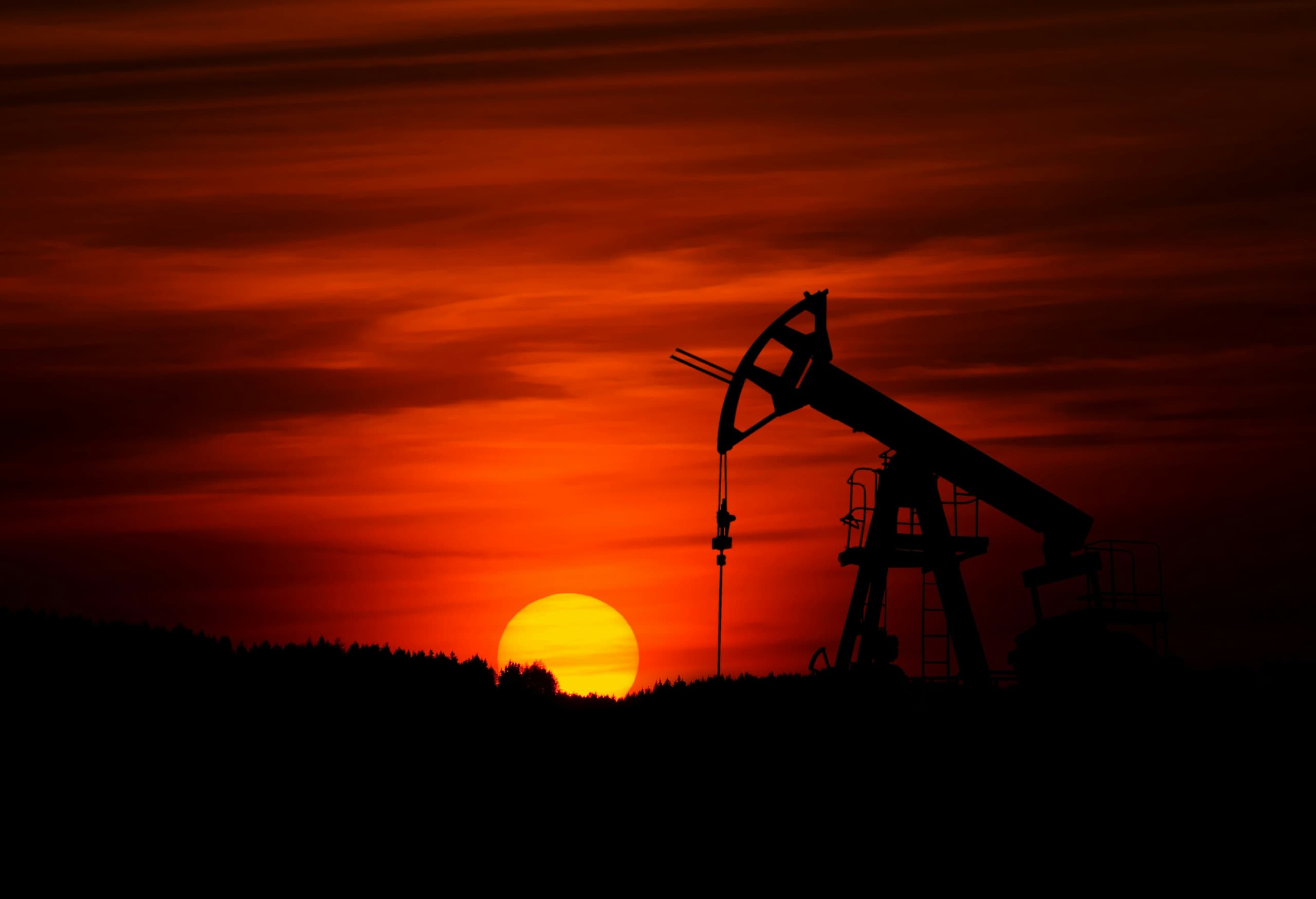 A gallery image from Landscapes: Dark Silhouette Of The Oil Pumpjack Against Sunset