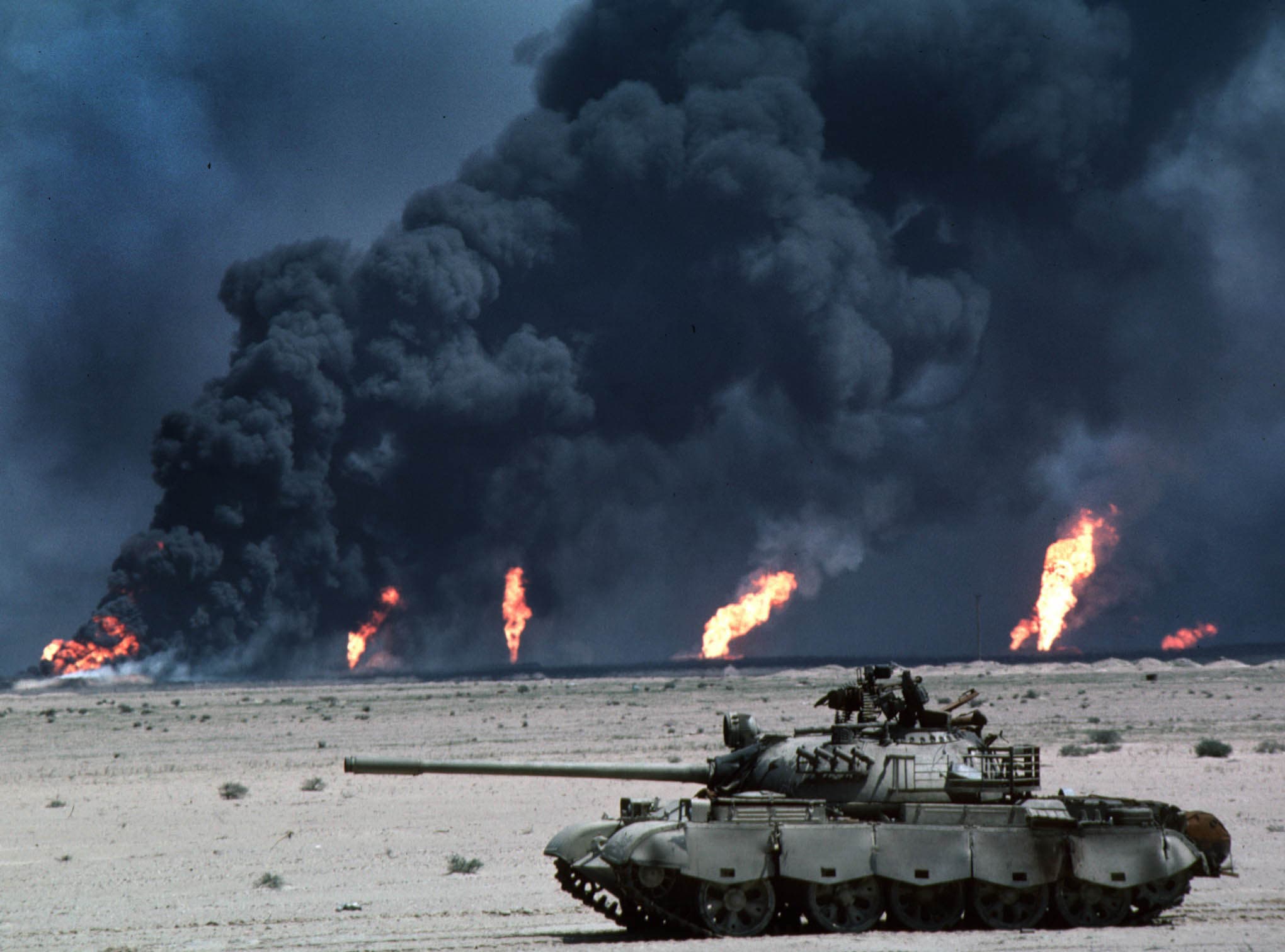 A gallery image from Military: Desert Storm Iraqi Tank Burning Oil Wells