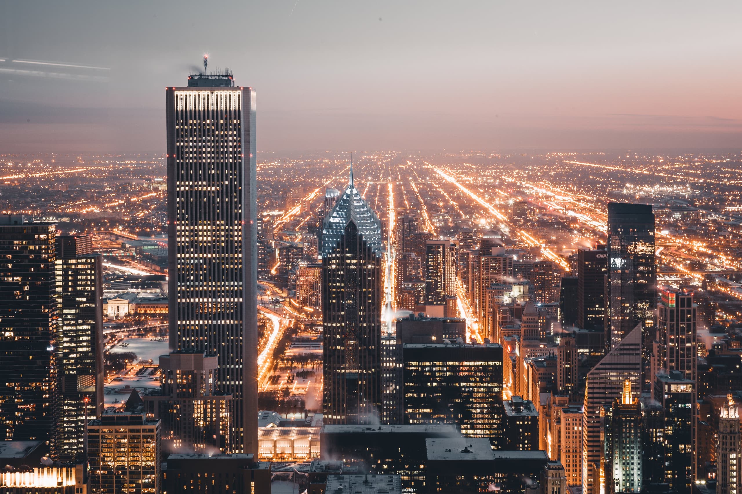 Chicago's illuminated urban grid at twilight