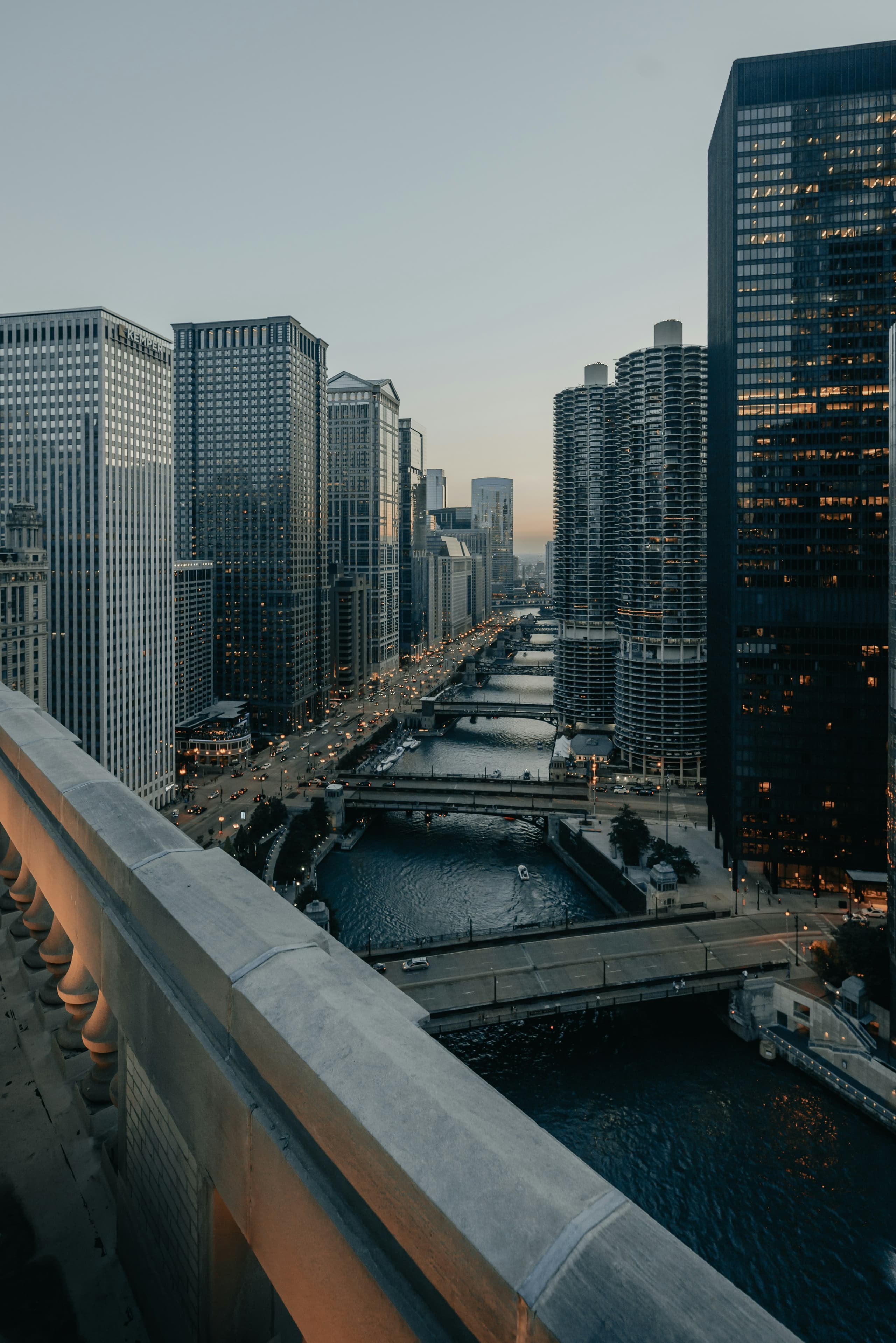Elevated dusk view of the Chicago River running through downtown Chicago