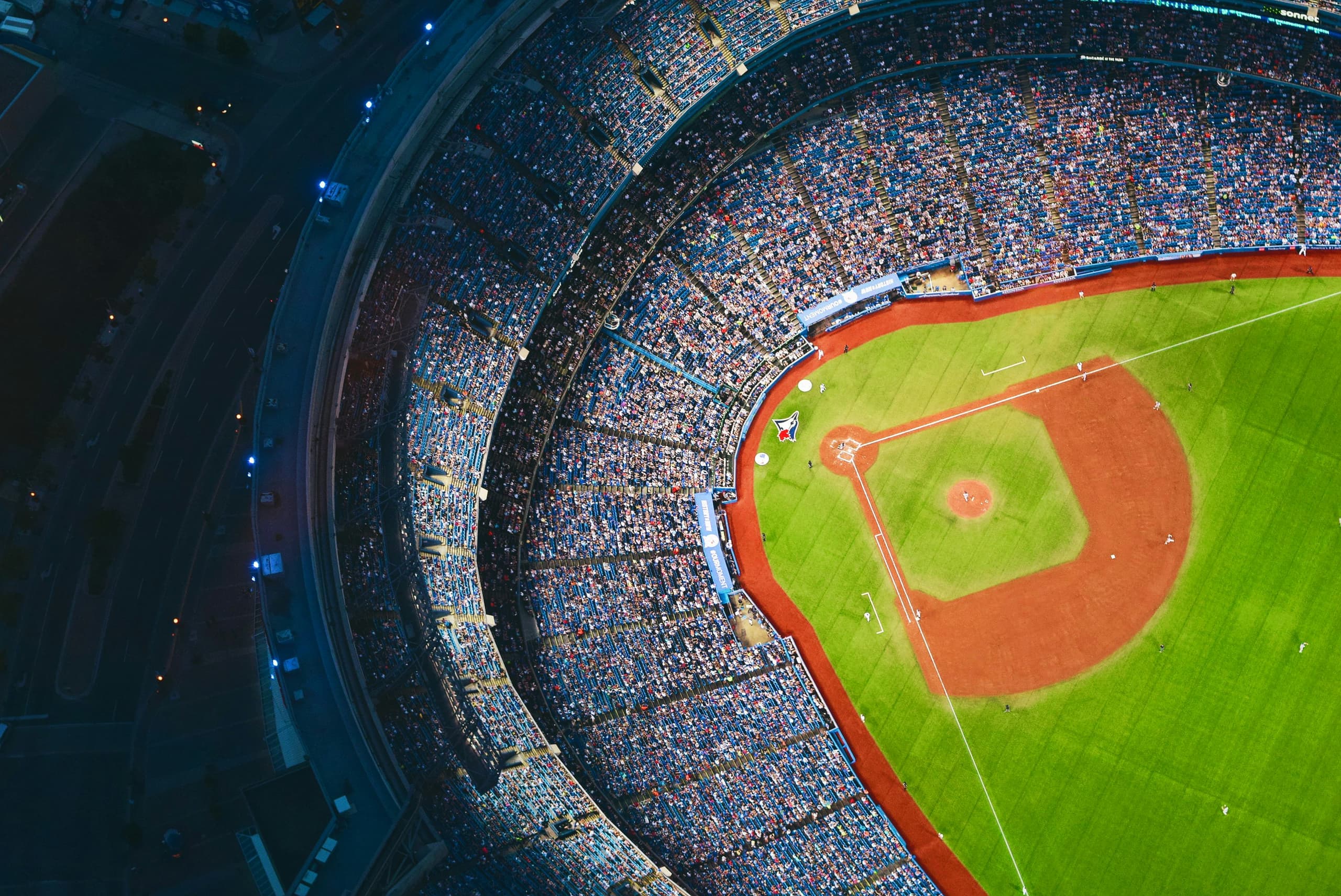 Aerial top-down view of illuminated baseball diamond