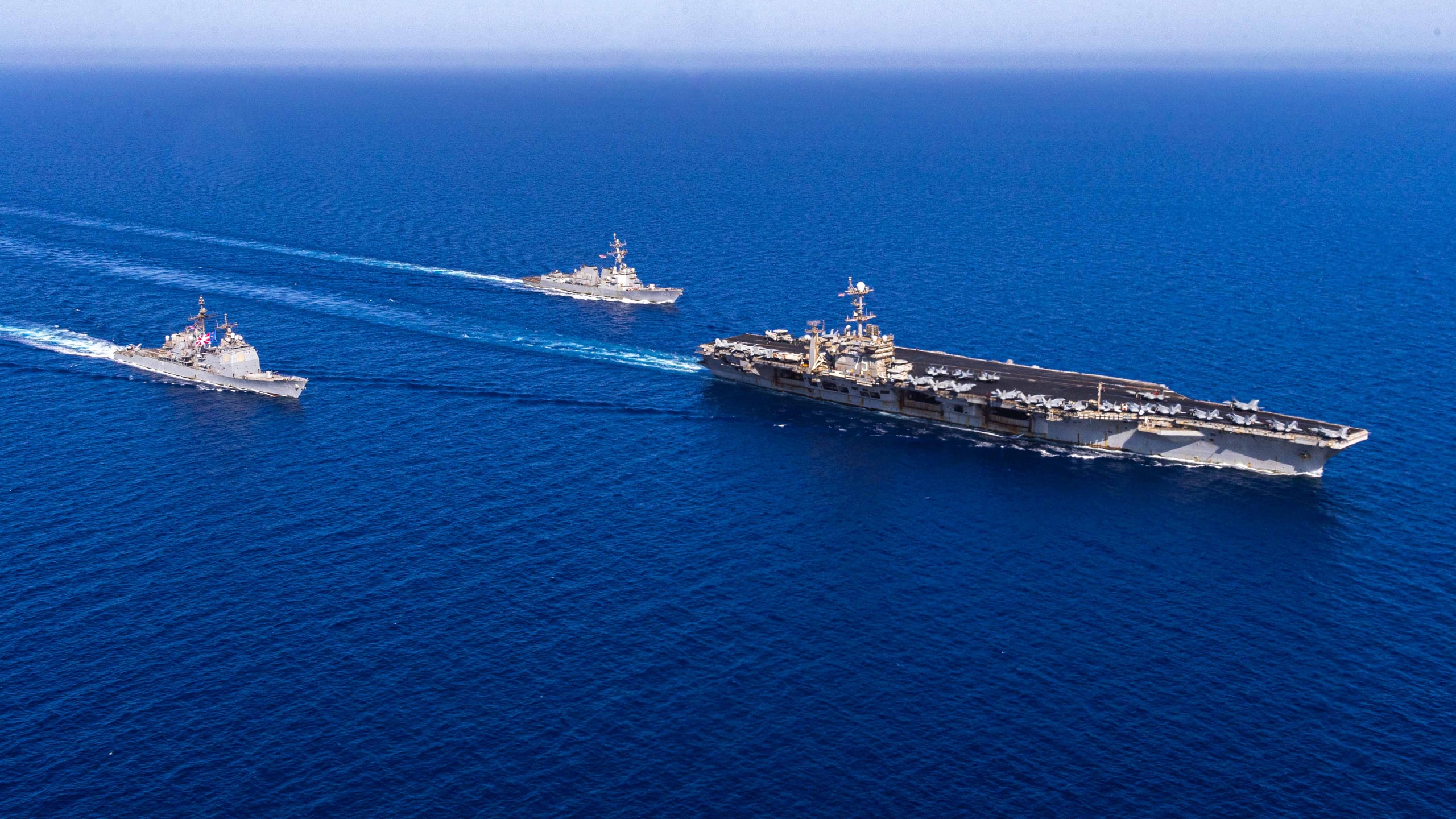 U.S. Navy carrier strike group operating in formation